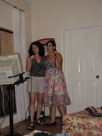 2004-05-21-Vanessa-graduation-party-5-karoake-Suzi.JPG