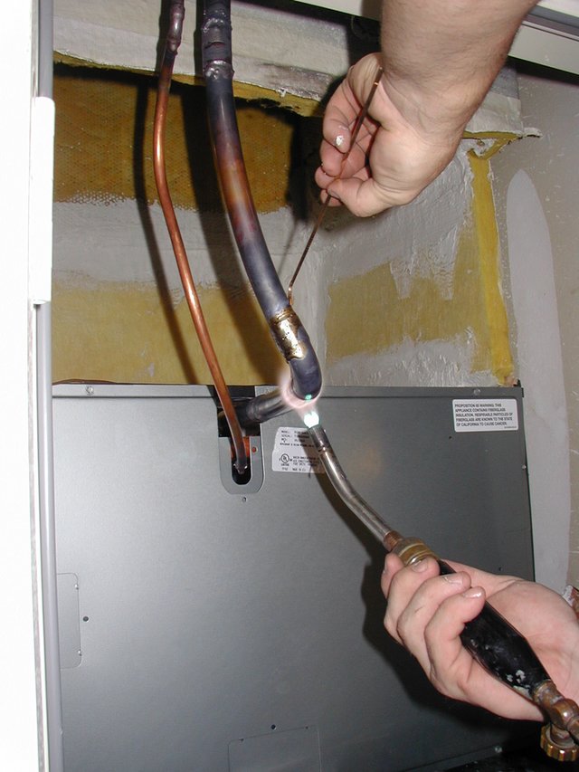 2004-06-04-Replace-AC-furnace-7-welding.JPG