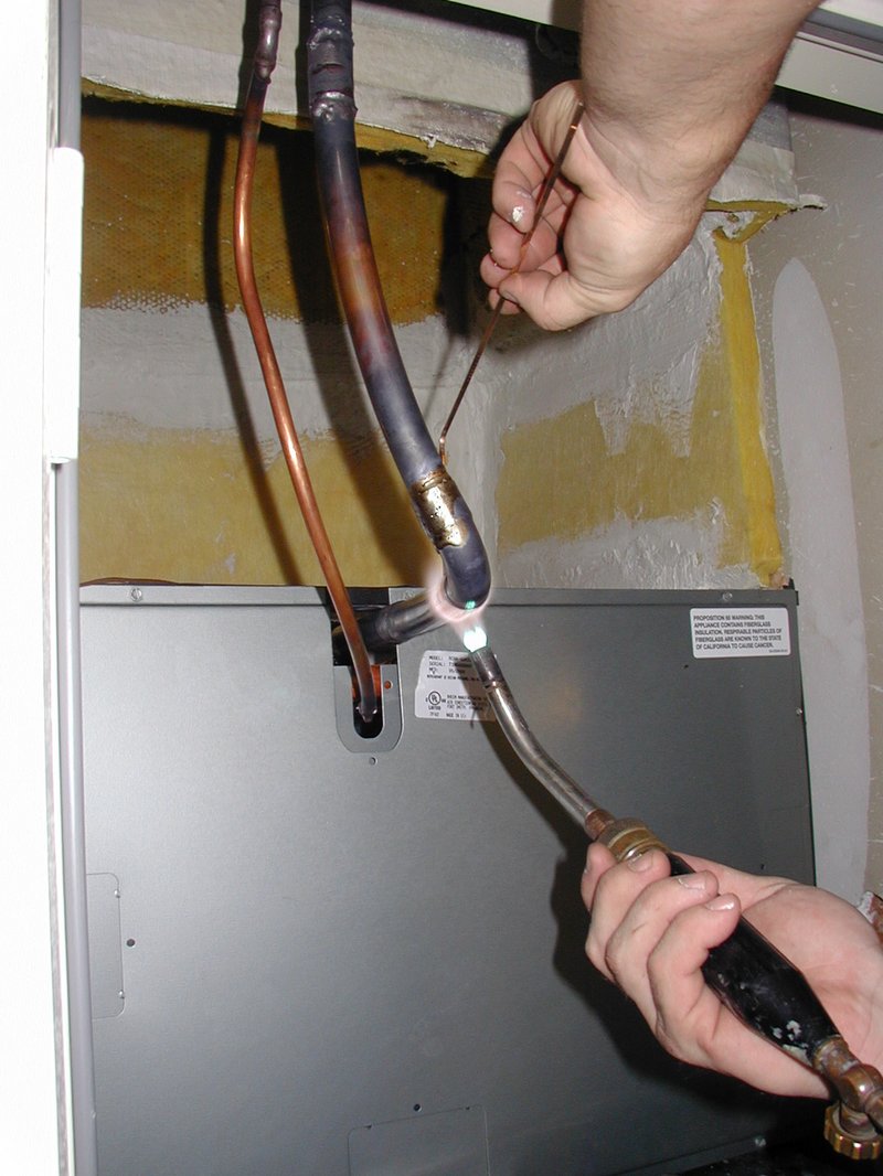 2004-06-04-Replace-AC-furnace-7-welding.JPG