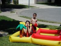 2004-07-24-cousins-sleepover-6-pool-Chance-Suzi.JPG