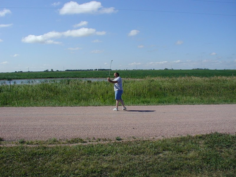 2004-07-30-Fish-Lake-Golf-08-John-on-dirt-road.JPG