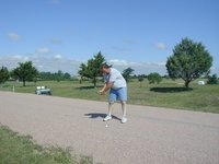 2004-07-30-Fish-Lake-Golf-09-John-on-dirt-road.JPG