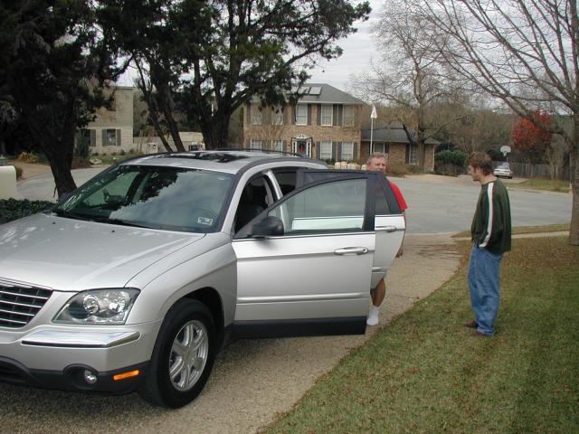 2004-12-24-Christmas-Eve-01-Justin-Katie-New-Car.JPG