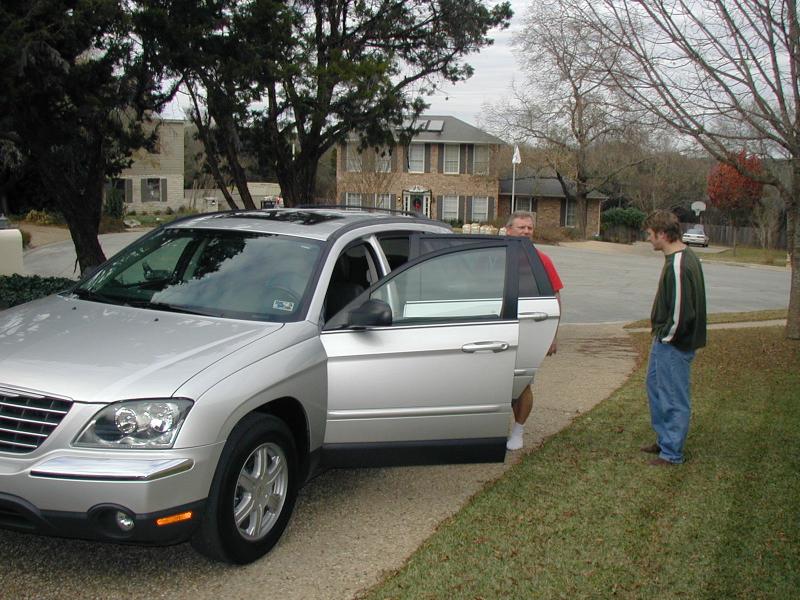 2004-12-24-Christmas-Eve-01-Justin-Katie-New-Car.JPG