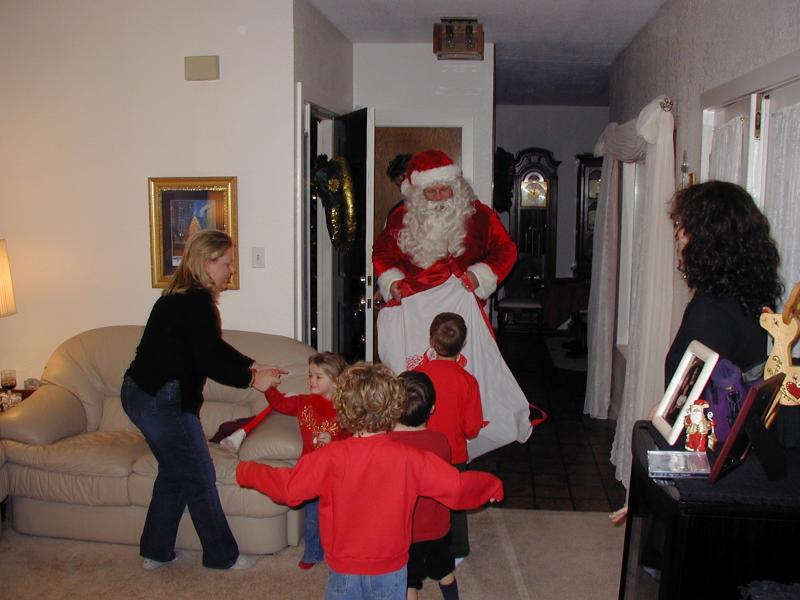 2004-12-24-Christmas-Eve-08-Santa-Chance-Dax-Vale-Kyla-Katie.JPG