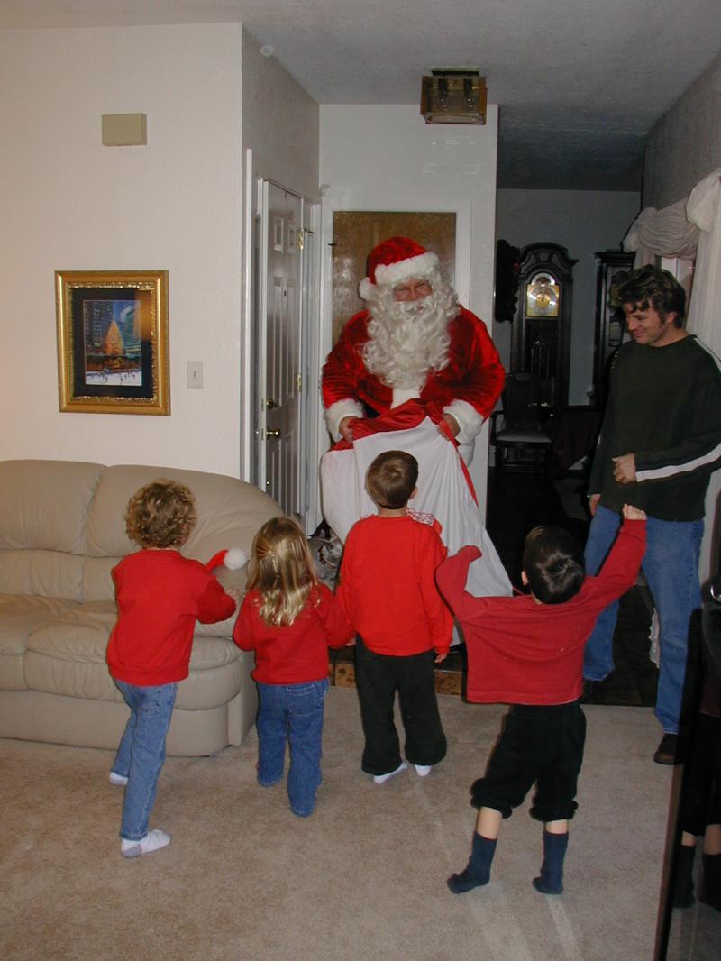2004-12-24-Christmas-Eve-09-Santa-Chance-Dax-Vale-Kyla-Justin.JPG