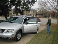 2004-12-24-Christmas-Eve-01-Justin-Katie-New-Car.JPG