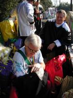 2005-02-05-Mardi-Gras-07-float-Mike-loading-beads.JPG