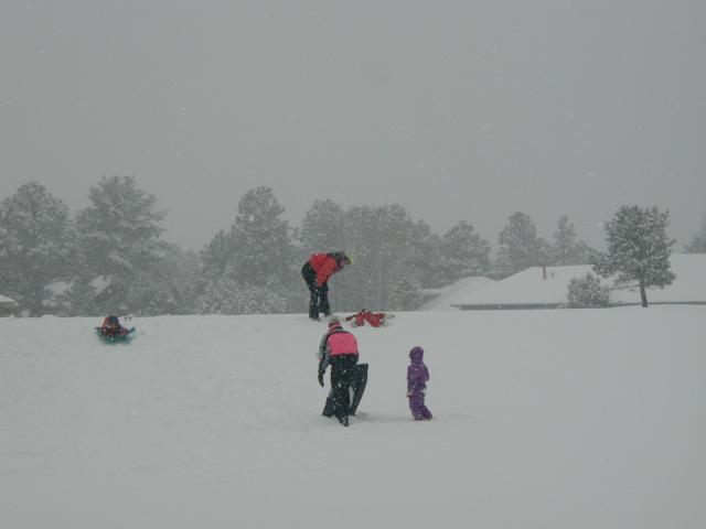 2005/03(March)/Ruidoso/Day3-snowed-in/640x480_2005-03-15-Ruidoso-snowed-in-21-sledding-Dax-snow-angel.JPG