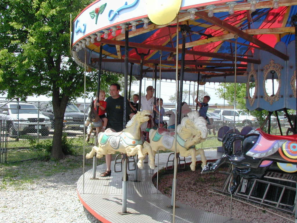 2005/04(April)/Zachary-soccer-party/1024x768_2005-04-16-Zachary-bday-Kiddie-Acres-12-Travis-Chance-Dax-merry-go-round.JPG