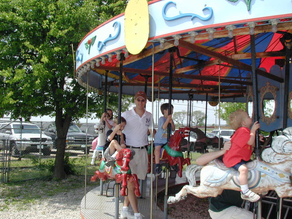 2005/04(April)/Zachary-soccer-party/1024x768_2005-04-16-Zachary-bday-Kiddie-Acres-13-Travis-Chance-Dax-merry-go-round.JPG