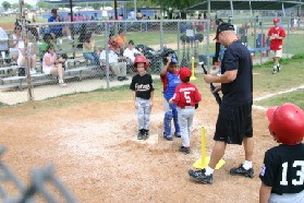 2005-05-14-Chance-Tball-33-running-to-home-plate-still-SAFE.JPG