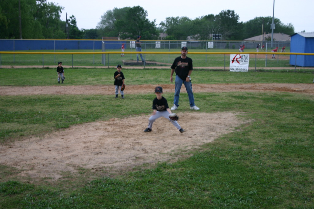 2005/05(May)/9th-Chance-Tball/1024x768_2005-05-09-T-ball-Chance-19-pitcher-blurry.JPG