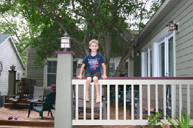 2005-05-29-Dinner-at-Allums-07-Chance-jumping.JPG