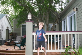 2005-05-29-Dinner-at-Allums-08-Chance-jumping.JPG