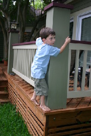 2005-05-29-Dinner-at-Allums-09-Dax-climbing.JPG