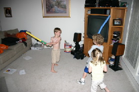 2005-05-13-cousins-over-13-sword-fights-Chance-Vale-Kyla.JPG