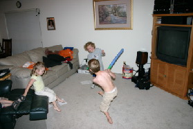 2005-05-13-cousins-over-17-sword-fights-Chance-Vale-Kyla.JPG