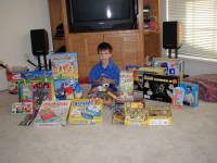 2005-05-01-Dax-4th-Bday-70-presents-loot.JPG
