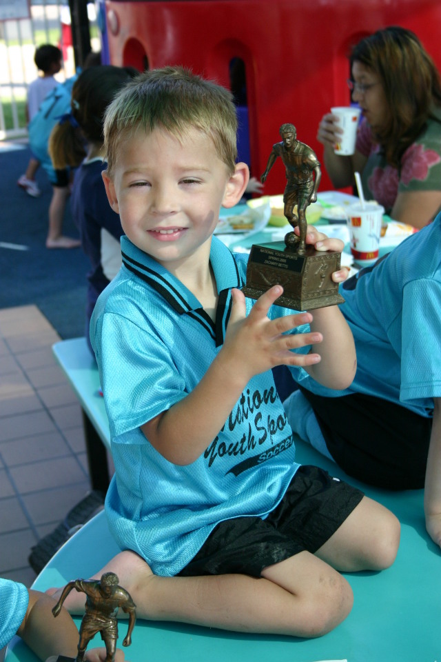 2005/05(May)/Dax-Soccer/640x480_2005-05-21-Final-Soccer-Game-35-Zach-trophy.JPG