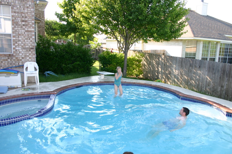 2005-05-30-Lasater-Dinner-pool-12-Megan-jumping.JPG