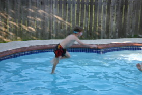 2005-05-30-Lasater-Dinner-pool-06-Chance-jumping.JPG