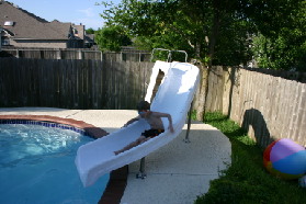 2005-05-30-Lasater-Dinner-pool-09-Chance-sliding.JPG