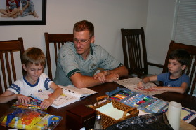 2005-06-15-Travis-Chance-Dax-studying-3.JPG