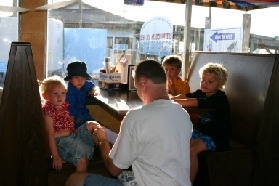2005-07-01-Port-Aransas-Dinner-2-Zeta-Dax-Doug-Chance-Zen.jpg