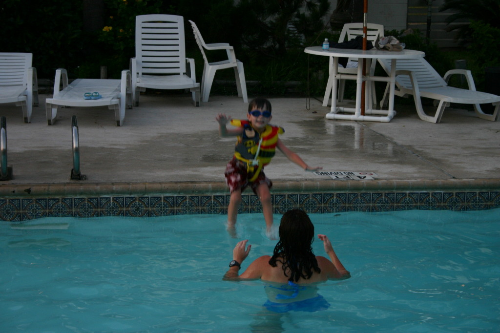 2005-07-02-Port-Aransas-70-pool-Dax-jumping-Suzi.jpg