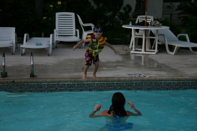 2005-07-02-Port-Aransas-69-pool-Dax-jumping-Suzi.jpg