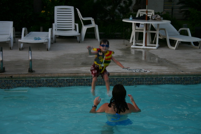 2005-07-02-Port-Aransas-70-pool-Dax-jumping-Suzi.jpg