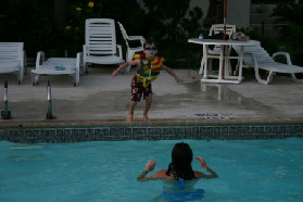 2005-07-02-Port-Aransas-69-pool-Dax-jumping-Suzi.jpg