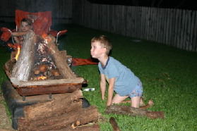 2005-08-06-Camping-at-Justins-house-18-Chance-blowing-fire.JPG