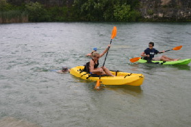 2005-08-04-PureAustin-swim-22-Suzi-dragged-by-Desiree-lightning.JPG