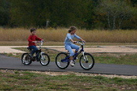 2005-10-30-Camping-05-Berry-Springs-biking-Dax-Brittney.JPG