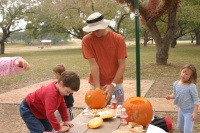 2005/10(October)/Halloween/2005-10-30-pumpkin-carving-01-Chance-Dax-Travis-Brittney.JPG