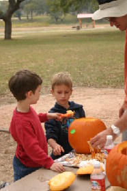 2005-10-30-pumpkin-carving-03-Chance-Dax-Travis.JPG