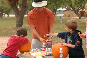 2005-10-30-pumpkin-carving-12-Chance-Dax-Travis.JPG