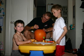 2005-10-30-pumpkin-carving-18-Chance-Dax-Travis.JPG