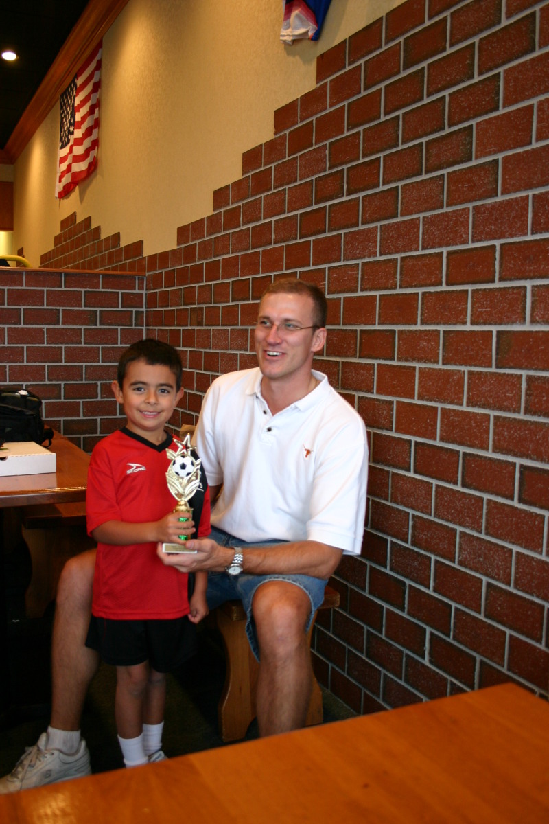 2005-11-13-TigerShark-soccer-party-04-Travis-Sam.JPG