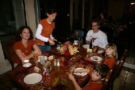 2005-11-25-Thanksgiving-33-Suzi-Heather-Josh-Kyla-Dax-table.JPG