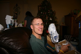 2005-12-24-Christmas-Eve-61-Travis-running-shoes.JPG
