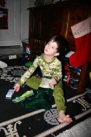 2005-12-25-Christmas-05-Stockings-Dax.JPG