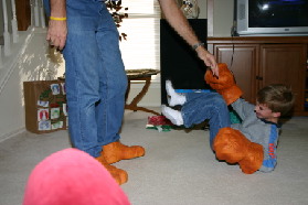 2005-12-25-Christmas-24-Grammys-Chance-Travis-THING-fighting.JPG