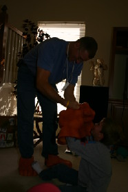 2005-12-25-Christmas-29-Grammys-Chance-Travis-THING-fighting.JPG