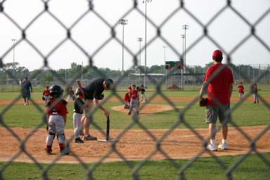2006-05-04-Tball-4-Case-pitching-Amanda-catching-Travis.JPG