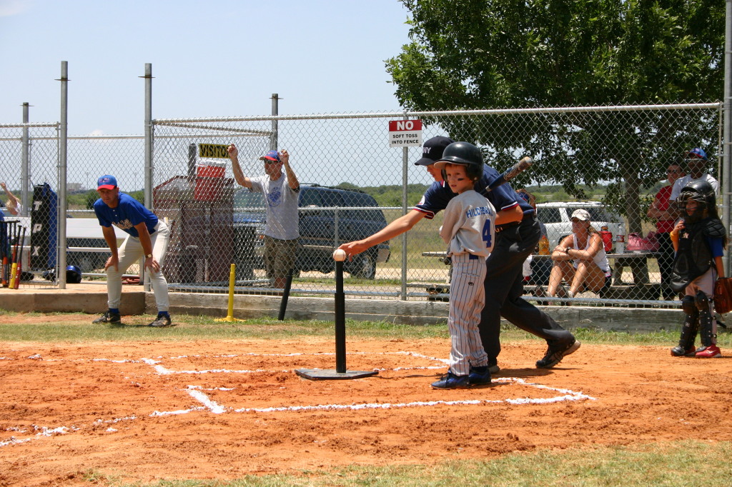 2006-06-17-Tball-AllStars-Bulldogs-Hays-CO-037-Chance-looking-at-coach.JPG