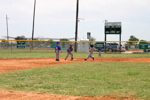 2006-06-17-Tball-AllStars-Bulldogs-Hays-CO-029-Joseph-out-at-2nd.JPG