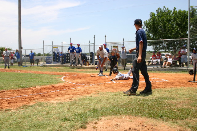 2006-06-17-Tball-AllStars-Bulldogs-Hays-CO-045-Ryan-slides-home.JPG